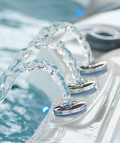 Close-up of jets of water on a hot tub.
